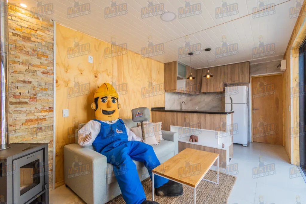 Sala de estar con decoración moderna, estufa a leña y mister construcciones en sofá