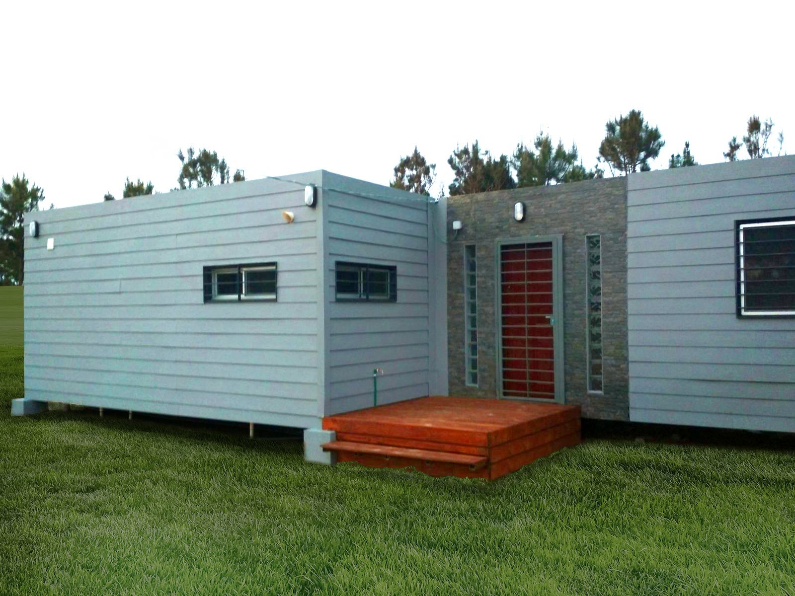 Casa contenedor con deck y frente en piedra